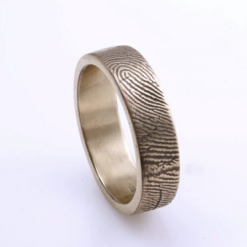 Love these fingerprint wedding rings by Brent and Jess
